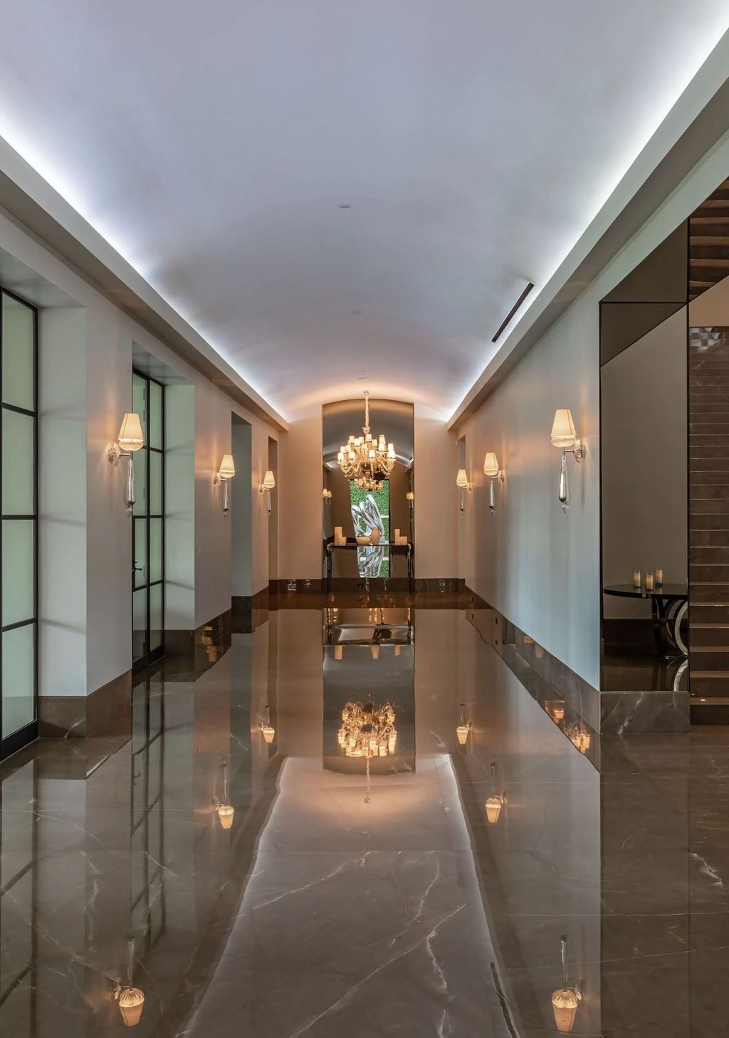 271 South Mapleton Drive Home in Los Angeles, California. Welcome to 'Il Magione' on South Mapleton Dr, Los Angeles' most prestigious address. Spanning 31,450 square feet on 1.4 flat acres, this luxury compound boasts Fendi furnishings, a bowling alley, movie theatre, gym, wine cellar, indoor pool, and more. 