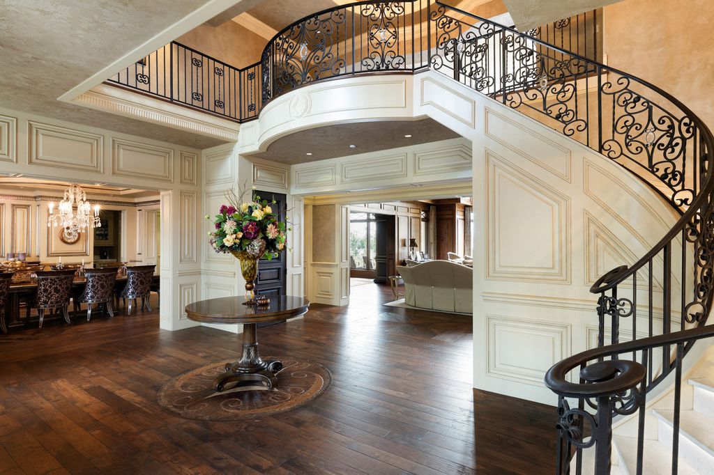 3770 Northome Road Home in Wayzata, Minnesota. Discover the epitome of luxury living on Lake Minnetonka with this John Kraemer & Sons masterpiece. From the luxurious master suite to the state-of-the-art amenities including a bowling alley, golf simulator, and Cavern Music Club, no detail has been overlooked. 
