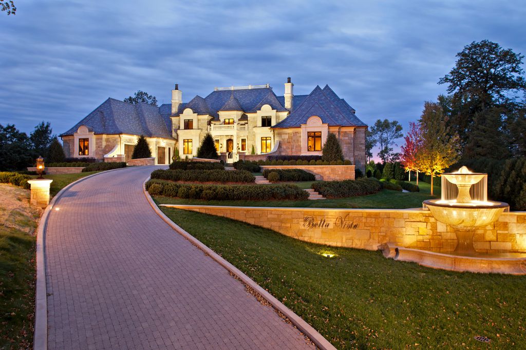 3770 Northome Road Home in Wayzata, Minnesota. Discover the epitome of luxury living on Lake Minnetonka with this John Kraemer & Sons masterpiece. From the luxurious master suite to the state-of-the-art amenities including a bowling alley, golf simulator, and Cavern Music Club, no detail has been overlooked. 