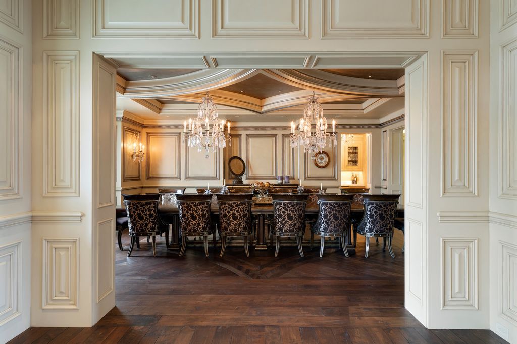 3770 Northome Road Home in Wayzata, Minnesota. Discover the epitome of luxury living on Lake Minnetonka with this John Kraemer & Sons masterpiece. From the luxurious master suite to the state-of-the-art amenities including a bowling alley, golf simulator, and Cavern Music Club, no detail has been overlooked. 