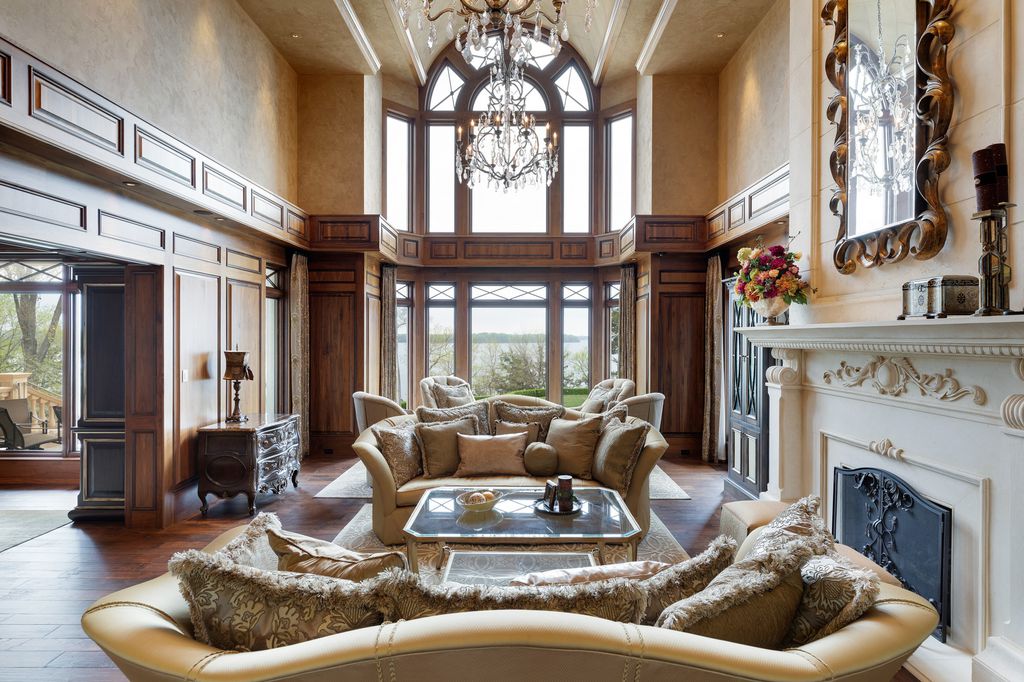 3770 Northome Road Home in Wayzata, Minnesota. Discover the epitome of luxury living on Lake Minnetonka with this John Kraemer & Sons masterpiece. From the luxurious master suite to the state-of-the-art amenities including a bowling alley, golf simulator, and Cavern Music Club, no detail has been overlooked. 