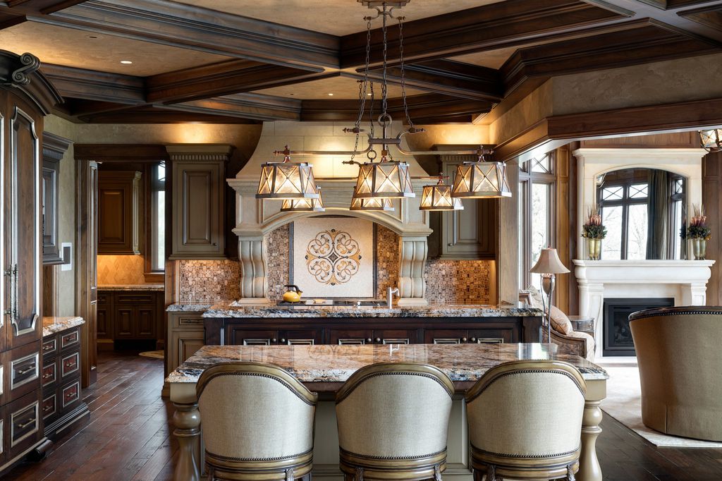 3770 Northome Road Home in Wayzata, Minnesota. Discover the epitome of luxury living on Lake Minnetonka with this John Kraemer & Sons masterpiece. From the luxurious master suite to the state-of-the-art amenities including a bowling alley, golf simulator, and Cavern Music Club, no detail has been overlooked. 