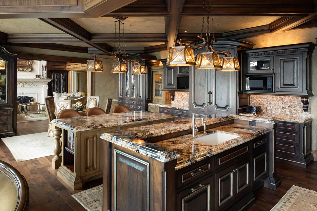 3770 Northome Road Home in Wayzata, Minnesota. Discover the epitome of luxury living on Lake Minnetonka with this John Kraemer & Sons masterpiece. From the luxurious master suite to the state-of-the-art amenities including a bowling alley, golf simulator, and Cavern Music Club, no detail has been overlooked. 