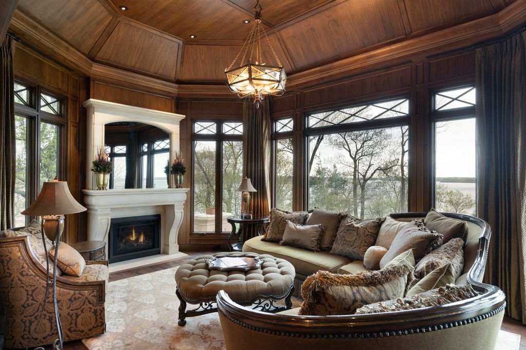 3770 Northome Road Home in Wayzata, Minnesota. Discover the epitome of luxury living on Lake Minnetonka with this John Kraemer & Sons masterpiece. From the luxurious master suite to the state-of-the-art amenities including a bowling alley, golf simulator, and Cavern Music Club, no detail has been overlooked. 
