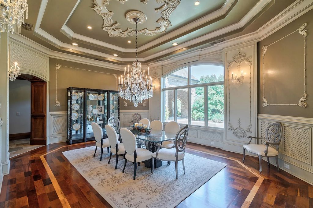 4186 N Arnold Mill Road Home in Woodstock, Georgia. Discover Stone Creek Manor, an exquisite estate offering hand-crafted elegance and olde world design in Cherokee County. Enjoy lower taxes, proximity to Roswell & Alpharetta, and easy access to local private schools and shopping.