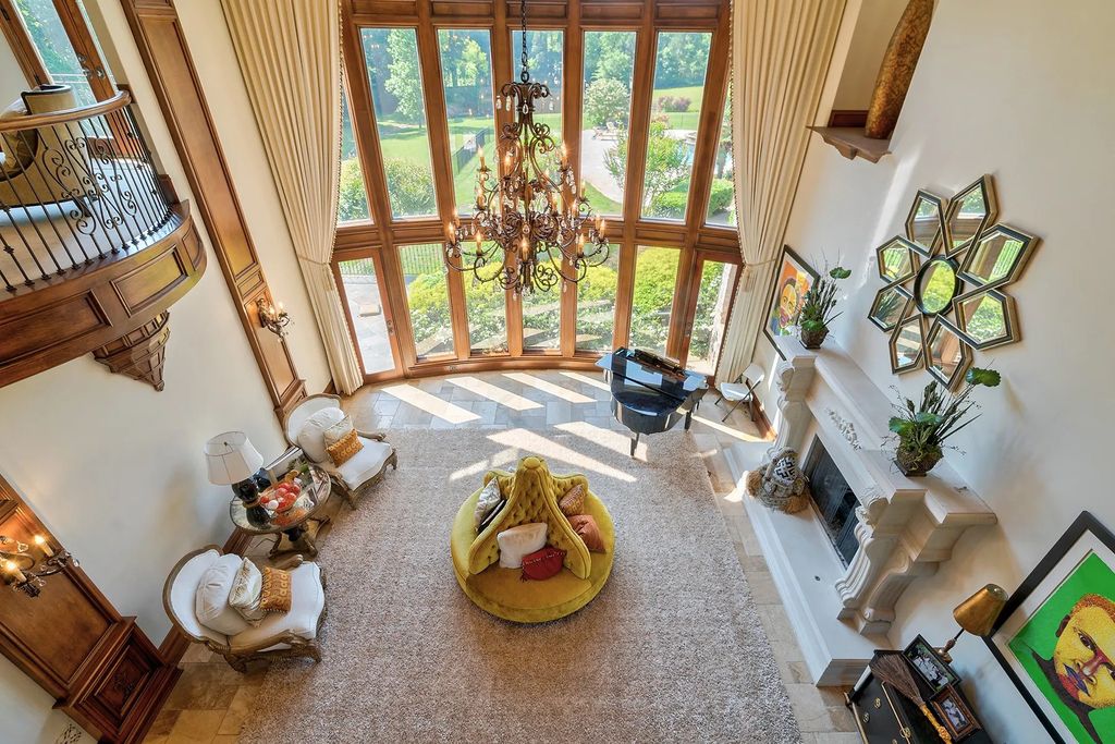4186 N Arnold Mill Road Home in Woodstock, Georgia. Discover Stone Creek Manor, an exquisite estate offering hand-crafted elegance and olde world design in Cherokee County. Enjoy lower taxes, proximity to Roswell & Alpharetta, and easy access to local private schools and shopping.