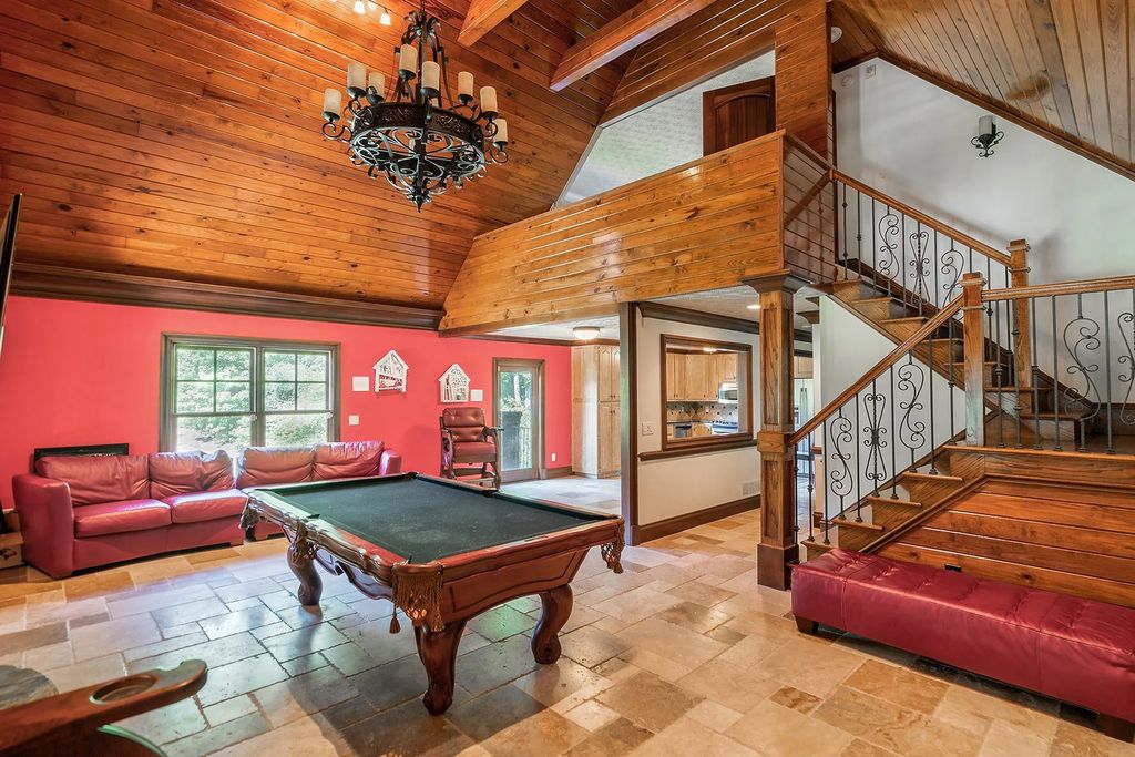 4186 N Arnold Mill Road Home in Woodstock, Georgia. Discover Stone Creek Manor, an exquisite estate offering hand-crafted elegance and olde world design in Cherokee County. Enjoy lower taxes, proximity to Roswell & Alpharetta, and easy access to local private schools and shopping.