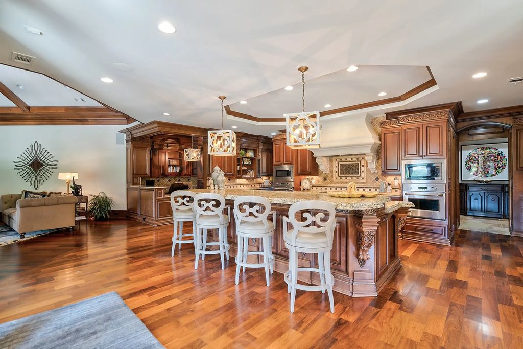 4186 N Arnold Mill Road Home in Woodstock, Georgia. Discover Stone Creek Manor, an exquisite estate offering hand-crafted elegance and olde world design in Cherokee County. Enjoy lower taxes, proximity to Roswell & Alpharetta, and easy access to local private schools and shopping.