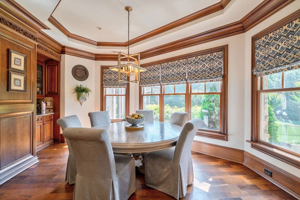 4186 N Arnold Mill Road Home in Woodstock, Georgia. Discover Stone Creek Manor, an exquisite estate offering hand-crafted elegance and olde world design in Cherokee County. Enjoy lower taxes, proximity to Roswell & Alpharetta, and easy access to local private schools and shopping.