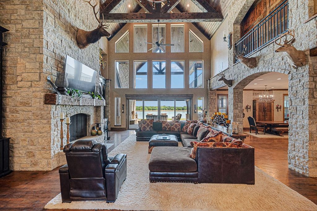 430 Chaparall Road Home in Ferris, Texas. Discover this breathtaking custom lake home nestled on 514 secluded acres, just 15 minutes south of Dallas. Meticulously constructed with stunning lake views from every room, this home features vaulted ceilings, a chef's dream kitchen, luxurious owner's suite, formal dining, study, and more. 