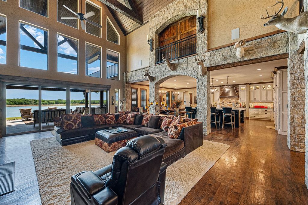 430 Chaparall Road Home in Ferris, Texas. Discover this breathtaking custom lake home nestled on 514 secluded acres, just 15 minutes south of Dallas. Meticulously constructed with stunning lake views from every room, this home features vaulted ceilings, a chef's dream kitchen, luxurious owner's suite, formal dining, study, and more. 