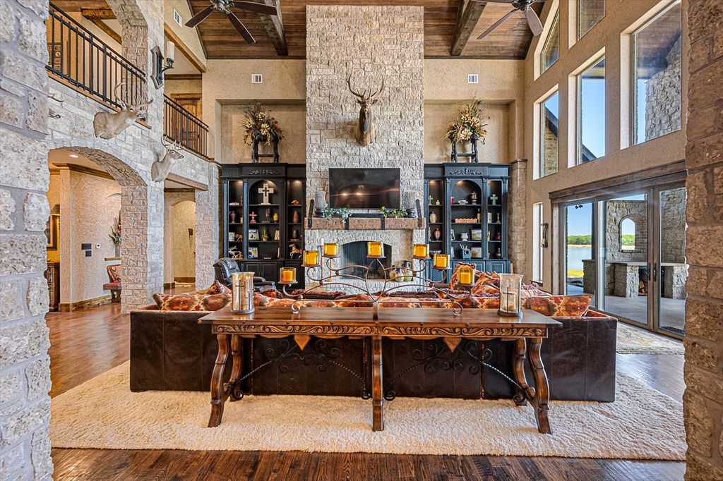 430 Chaparall Road Home in Ferris, Texas. Discover this breathtaking custom lake home nestled on 514 secluded acres, just 15 minutes south of Dallas. Meticulously constructed with stunning lake views from every room, this home features vaulted ceilings, a chef's dream kitchen, luxurious owner's suite, formal dining, study, and more. 