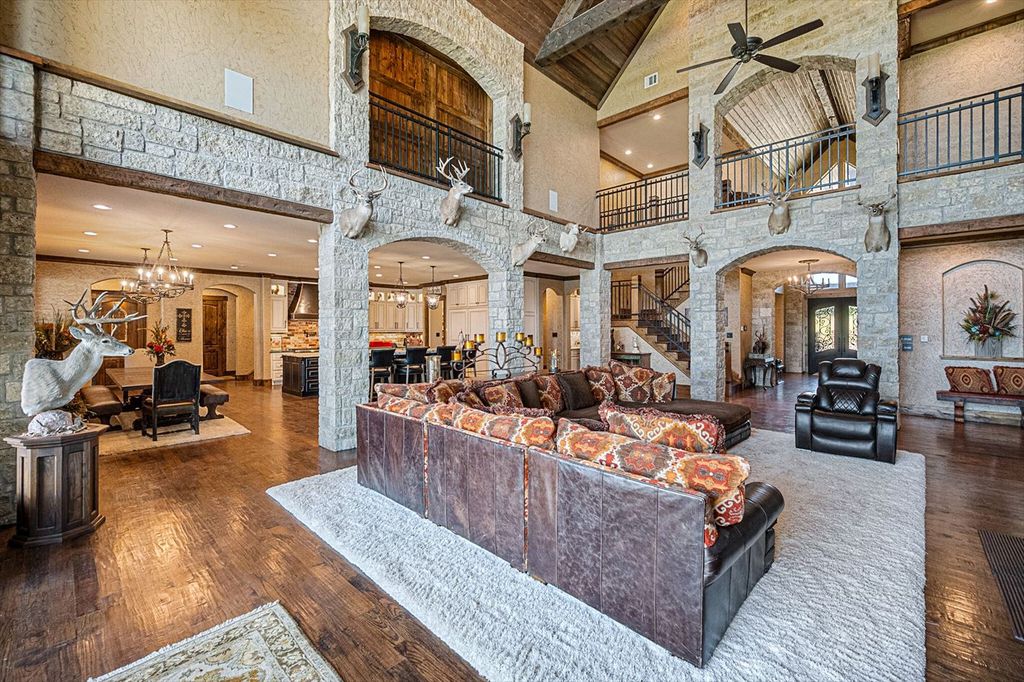 430 Chaparall Road Home in Ferris, Texas. Discover this breathtaking custom lake home nestled on 514 secluded acres, just 15 minutes south of Dallas. Meticulously constructed with stunning lake views from every room, this home features vaulted ceilings, a chef's dream kitchen, luxurious owner's suite, formal dining, study, and more. 