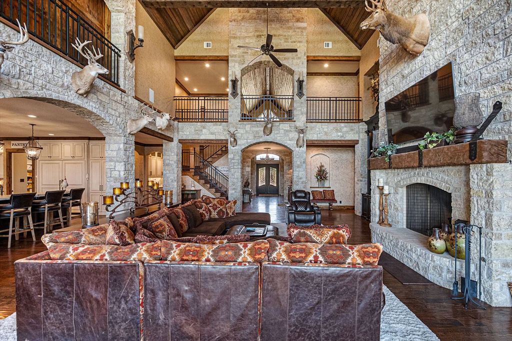 430 Chaparall Road Home in Ferris, Texas. Discover this breathtaking custom lake home nestled on 514 secluded acres, just 15 minutes south of Dallas. Meticulously constructed with stunning lake views from every room, this home features vaulted ceilings, a chef's dream kitchen, luxurious owner's suite, formal dining, study, and more. 