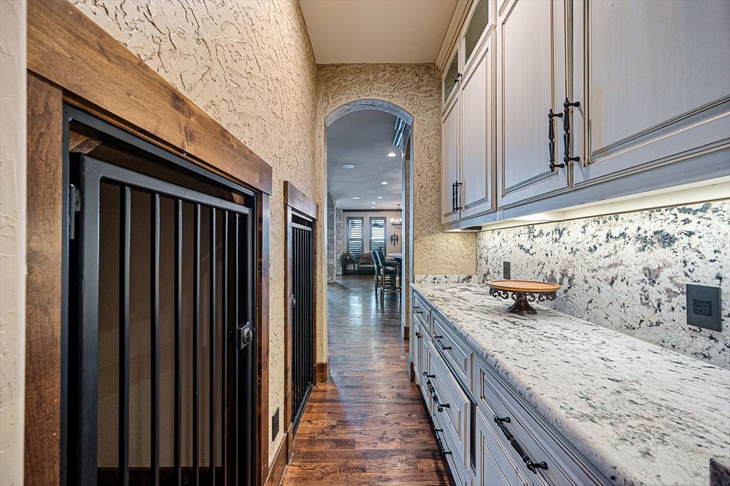 430 Chaparall Road Home in Ferris, Texas. Discover this breathtaking custom lake home nestled on 514 secluded acres, just 15 minutes south of Dallas. Meticulously constructed with stunning lake views from every room, this home features vaulted ceilings, a chef's dream kitchen, luxurious owner's suite, formal dining, study, and more. 