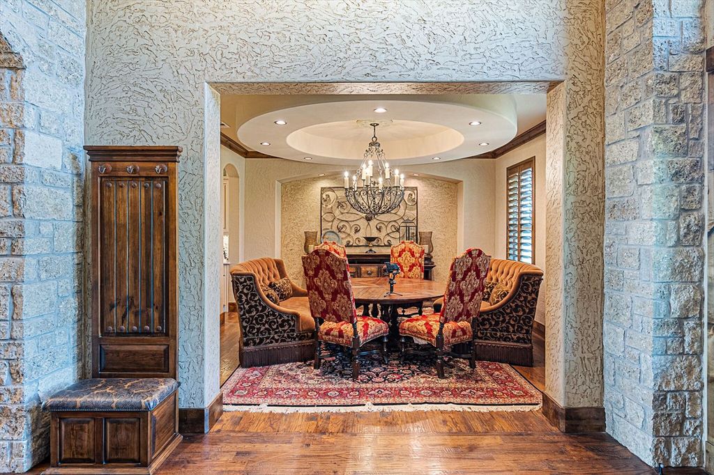 430 Chaparall Road Home in Ferris, Texas. Discover this breathtaking custom lake home nestled on 514 secluded acres, just 15 minutes south of Dallas. Meticulously constructed with stunning lake views from every room, this home features vaulted ceilings, a chef's dream kitchen, luxurious owner's suite, formal dining, study, and more. 