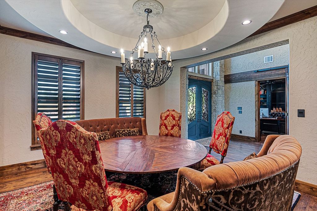 430 Chaparall Road Home in Ferris, Texas. Discover this breathtaking custom lake home nestled on 514 secluded acres, just 15 minutes south of Dallas. Meticulously constructed with stunning lake views from every room, this home features vaulted ceilings, a chef's dream kitchen, luxurious owner's suite, formal dining, study, and more. 