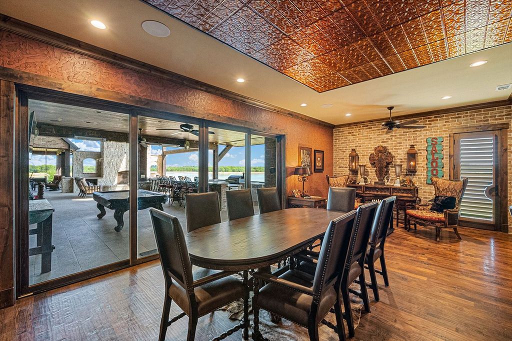 430 Chaparall Road Home in Ferris, Texas. Discover this breathtaking custom lake home nestled on 514 secluded acres, just 15 minutes south of Dallas. Meticulously constructed with stunning lake views from every room, this home features vaulted ceilings, a chef's dream kitchen, luxurious owner's suite, formal dining, study, and more. 
