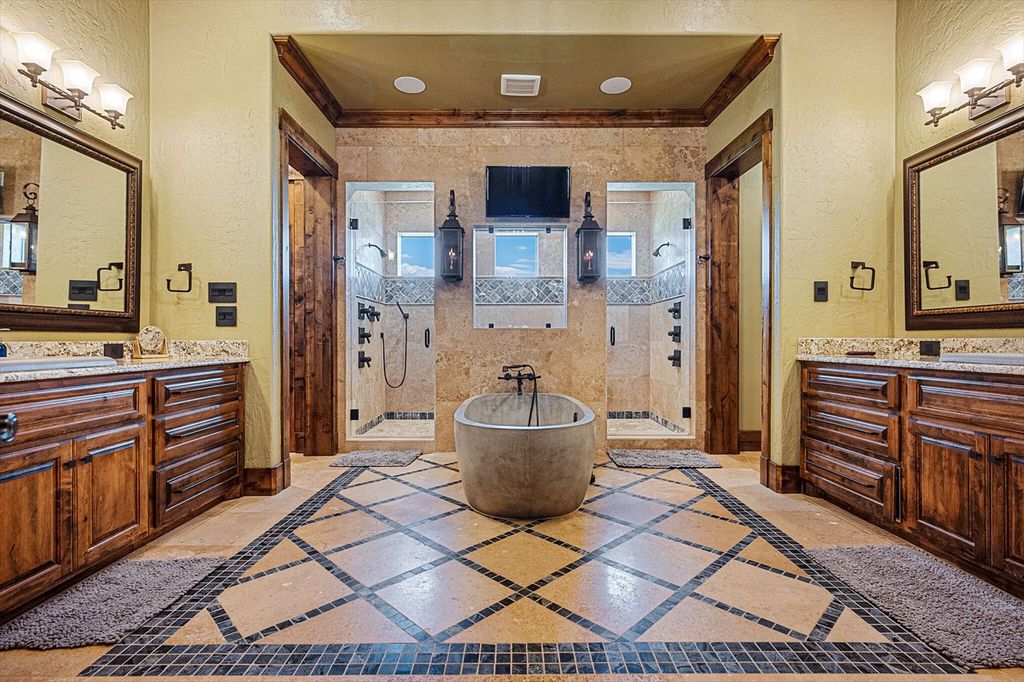 430 Chaparall Road Home in Ferris, Texas. Discover this breathtaking custom lake home nestled on 514 secluded acres, just 15 minutes south of Dallas. Meticulously constructed with stunning lake views from every room, this home features vaulted ceilings, a chef's dream kitchen, luxurious owner's suite, formal dining, study, and more. 