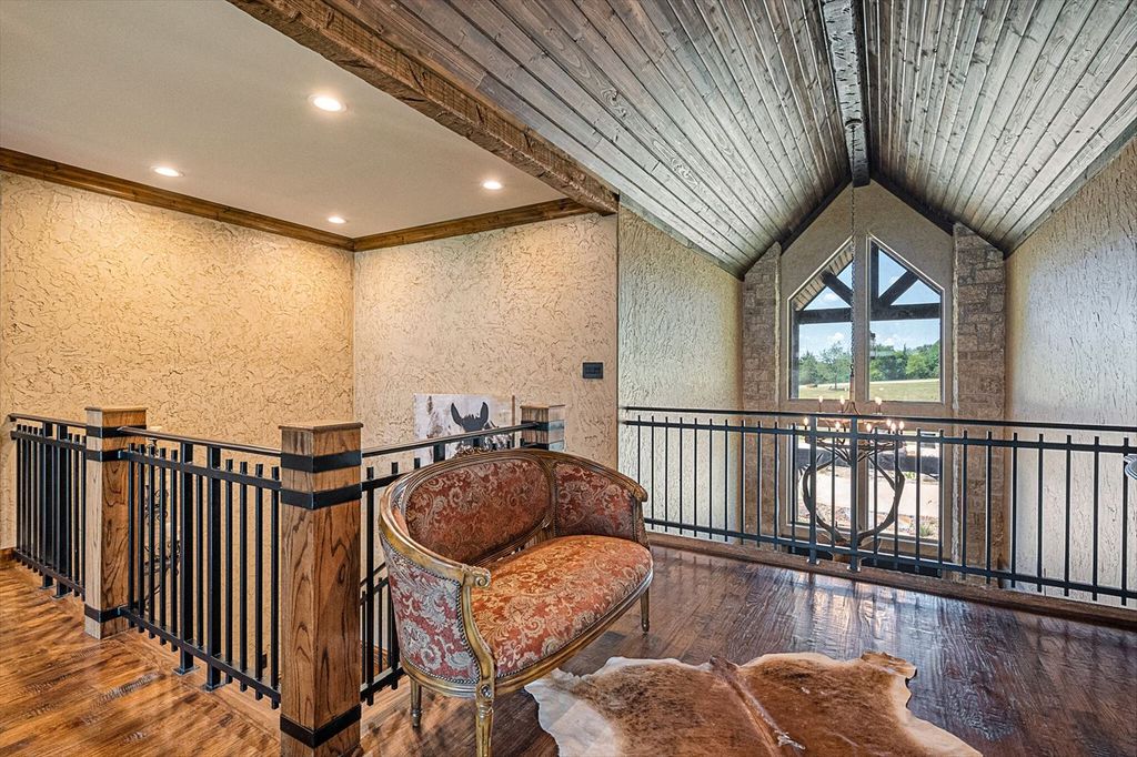 430 Chaparall Road Home in Ferris, Texas. Discover this breathtaking custom lake home nestled on 514 secluded acres, just 15 minutes south of Dallas. Meticulously constructed with stunning lake views from every room, this home features vaulted ceilings, a chef's dream kitchen, luxurious owner's suite, formal dining, study, and more. 