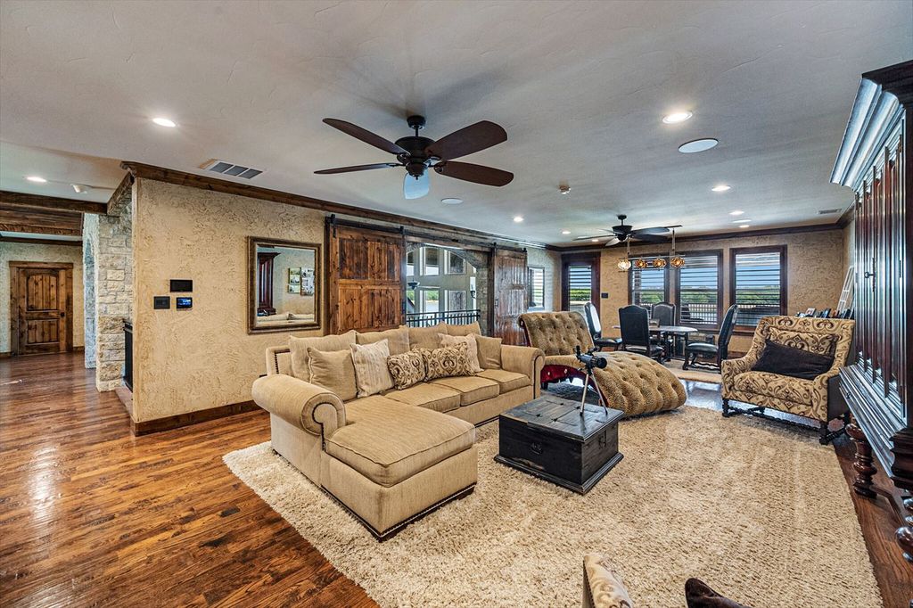 430 Chaparall Road Home in Ferris, Texas. Discover this breathtaking custom lake home nestled on 514 secluded acres, just 15 minutes south of Dallas. Meticulously constructed with stunning lake views from every room, this home features vaulted ceilings, a chef's dream kitchen, luxurious owner's suite, formal dining, study, and more. 