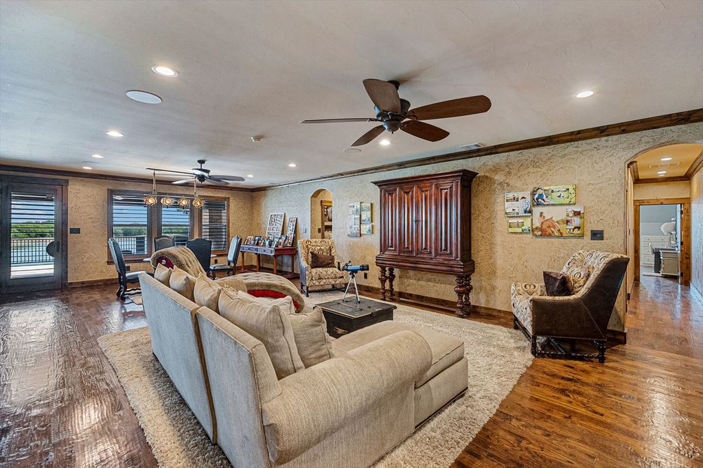 430 Chaparall Road Home in Ferris, Texas. Discover this breathtaking custom lake home nestled on 514 secluded acres, just 15 minutes south of Dallas. Meticulously constructed with stunning lake views from every room, this home features vaulted ceilings, a chef's dream kitchen, luxurious owner's suite, formal dining, study, and more. 