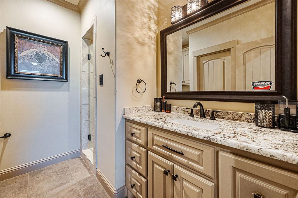 430 Chaparall Road Home in Ferris, Texas. Discover this breathtaking custom lake home nestled on 514 secluded acres, just 15 minutes south of Dallas. Meticulously constructed with stunning lake views from every room, this home features vaulted ceilings, a chef's dream kitchen, luxurious owner's suite, formal dining, study, and more. 