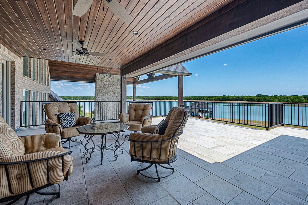 430 Chaparall Road Home in Ferris, Texas. Discover this breathtaking custom lake home nestled on 514 secluded acres, just 15 minutes south of Dallas. Meticulously constructed with stunning lake views from every room, this home features vaulted ceilings, a chef's dream kitchen, luxurious owner's suite, formal dining, study, and more. 
