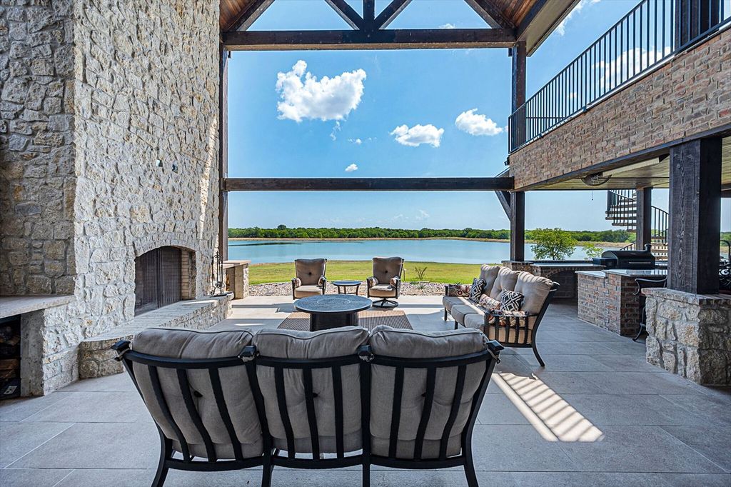 430 Chaparall Road Home in Ferris, Texas. Discover this breathtaking custom lake home nestled on 514 secluded acres, just 15 minutes south of Dallas. Meticulously constructed with stunning lake views from every room, this home features vaulted ceilings, a chef's dream kitchen, luxurious owner's suite, formal dining, study, and more. 