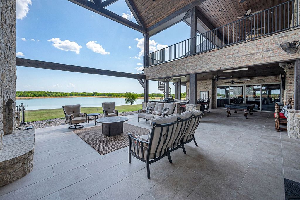 430 Chaparall Road Home in Ferris, Texas. Discover this breathtaking custom lake home nestled on 514 secluded acres, just 15 minutes south of Dallas. Meticulously constructed with stunning lake views from every room, this home features vaulted ceilings, a chef's dream kitchen, luxurious owner's suite, formal dining, study, and more. 