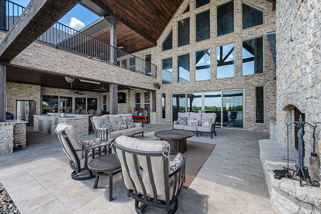 430 Chaparall Road Home in Ferris, Texas. Discover this breathtaking custom lake home nestled on 514 secluded acres, just 15 minutes south of Dallas. Meticulously constructed with stunning lake views from every room, this home features vaulted ceilings, a chef's dream kitchen, luxurious owner's suite, formal dining, study, and more. 