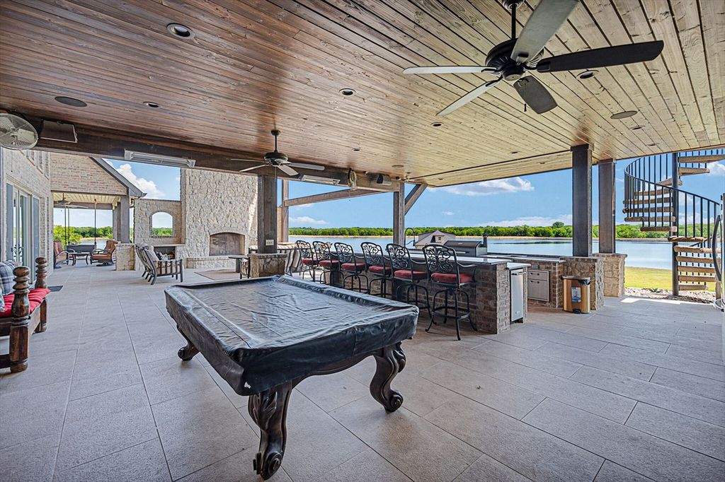 430 Chaparall Road Home in Ferris, Texas. Discover this breathtaking custom lake home nestled on 514 secluded acres, just 15 minutes south of Dallas. Meticulously constructed with stunning lake views from every room, this home features vaulted ceilings, a chef's dream kitchen, luxurious owner's suite, formal dining, study, and more. 