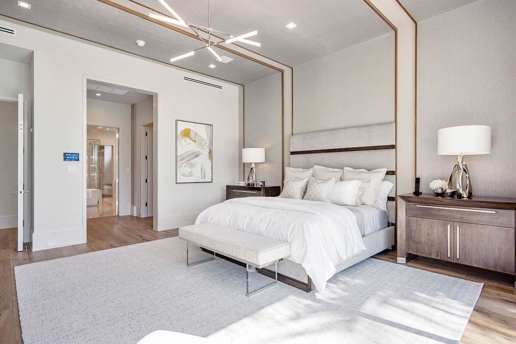 This prestigious Signature Estate within the Royal Palm Yacht & Country Club offers breathtaking views of lush golf course fairways.