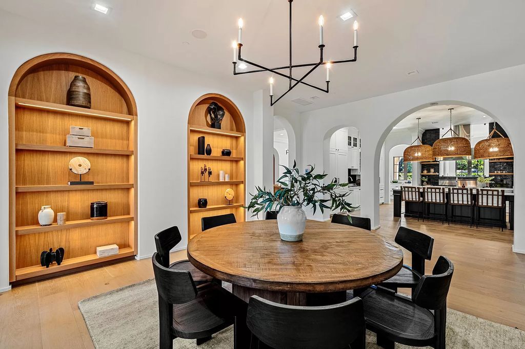 Originally crafted in 2003 by Dan Swanson of Addison Development, this newly remastered intracoastal estate seamlessly blends classic Spanish design with California chic.