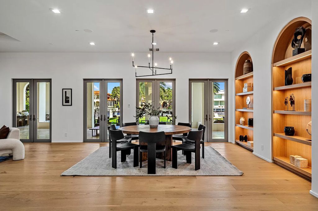 Originally crafted in 2003 by Dan Swanson of Addison Development, this newly remastered intracoastal estate seamlessly blends classic Spanish design with California chic.