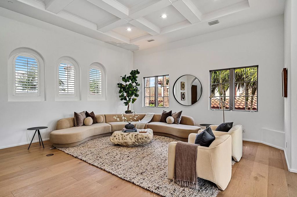 Originally crafted in 2003 by Dan Swanson of Addison Development, this newly remastered intracoastal estate seamlessly blends classic Spanish design with California chic.