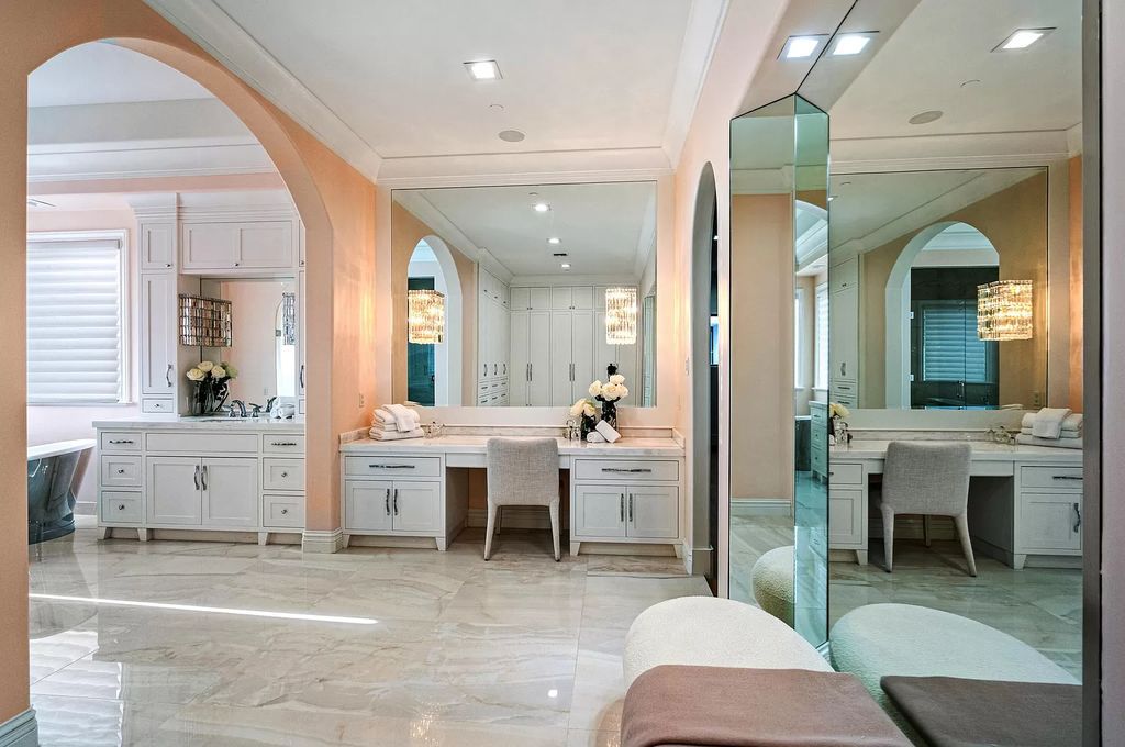 Originally crafted in 2003 by Dan Swanson of Addison Development, this newly remastered intracoastal estate seamlessly blends classic Spanish design with California chic.