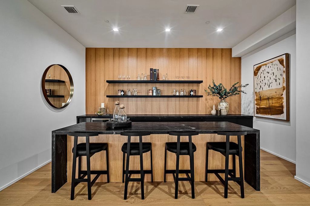 Originally crafted in 2003 by Dan Swanson of Addison Development, this newly remastered intracoastal estate seamlessly blends classic Spanish design with California chic.