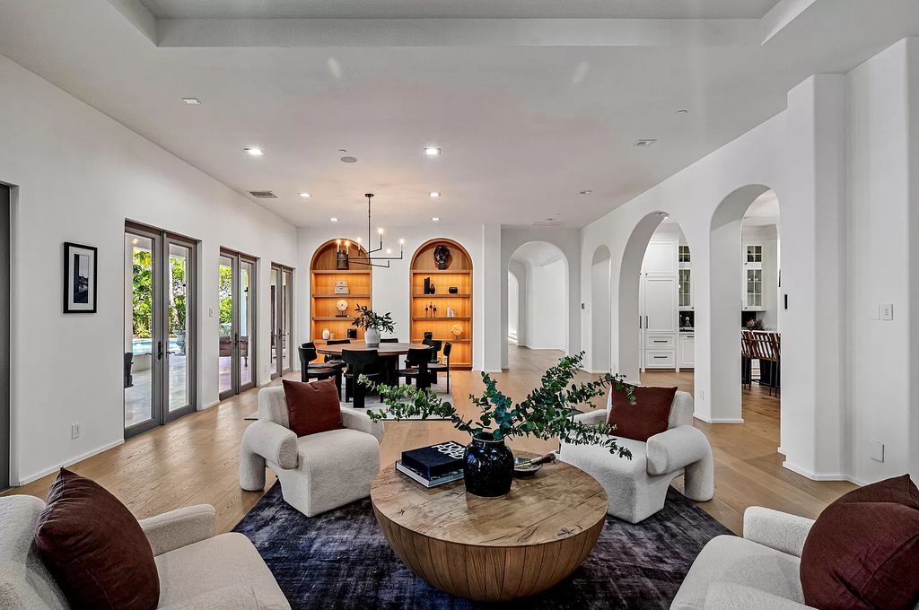 Originally crafted in 2003 by Dan Swanson of Addison Development, this newly remastered intracoastal estate seamlessly blends classic Spanish design with California chic.