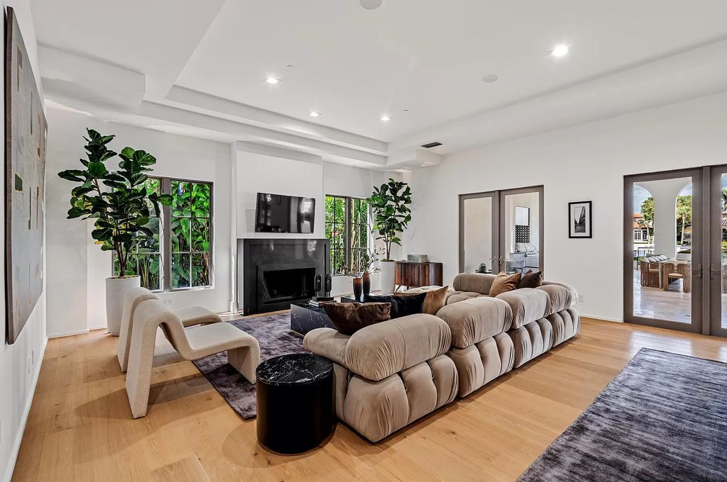 Originally crafted in 2003 by Dan Swanson of Addison Development, this newly remastered intracoastal estate seamlessly blends classic Spanish design with California chic.