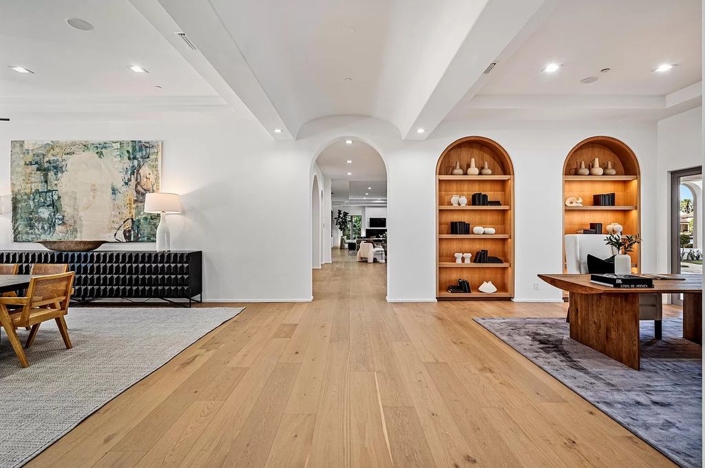 Originally crafted in 2003 by Dan Swanson of Addison Development, this newly remastered intracoastal estate seamlessly blends classic Spanish design with California chic.