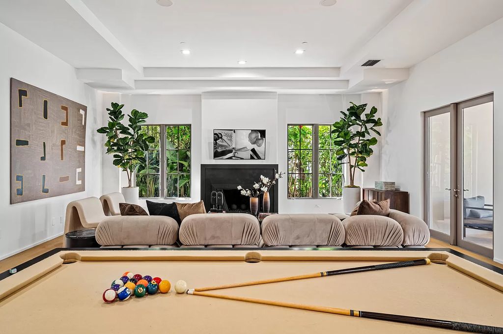 Originally crafted in 2003 by Dan Swanson of Addison Development, this newly remastered intracoastal estate seamlessly blends classic Spanish design with California chic.