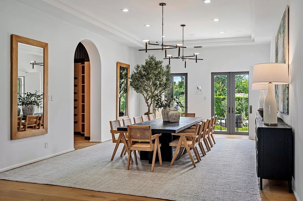 Originally crafted in 2003 by Dan Swanson of Addison Development, this newly remastered intracoastal estate seamlessly blends classic Spanish design with California chic.