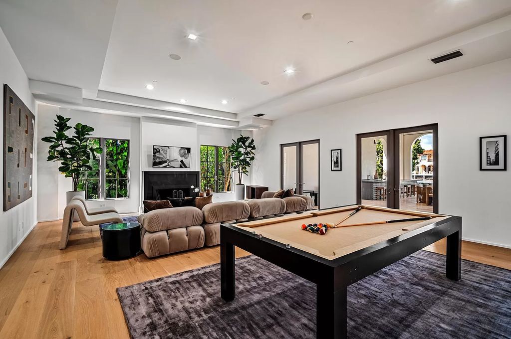 Originally crafted in 2003 by Dan Swanson of Addison Development, this newly remastered intracoastal estate seamlessly blends classic Spanish design with California chic.