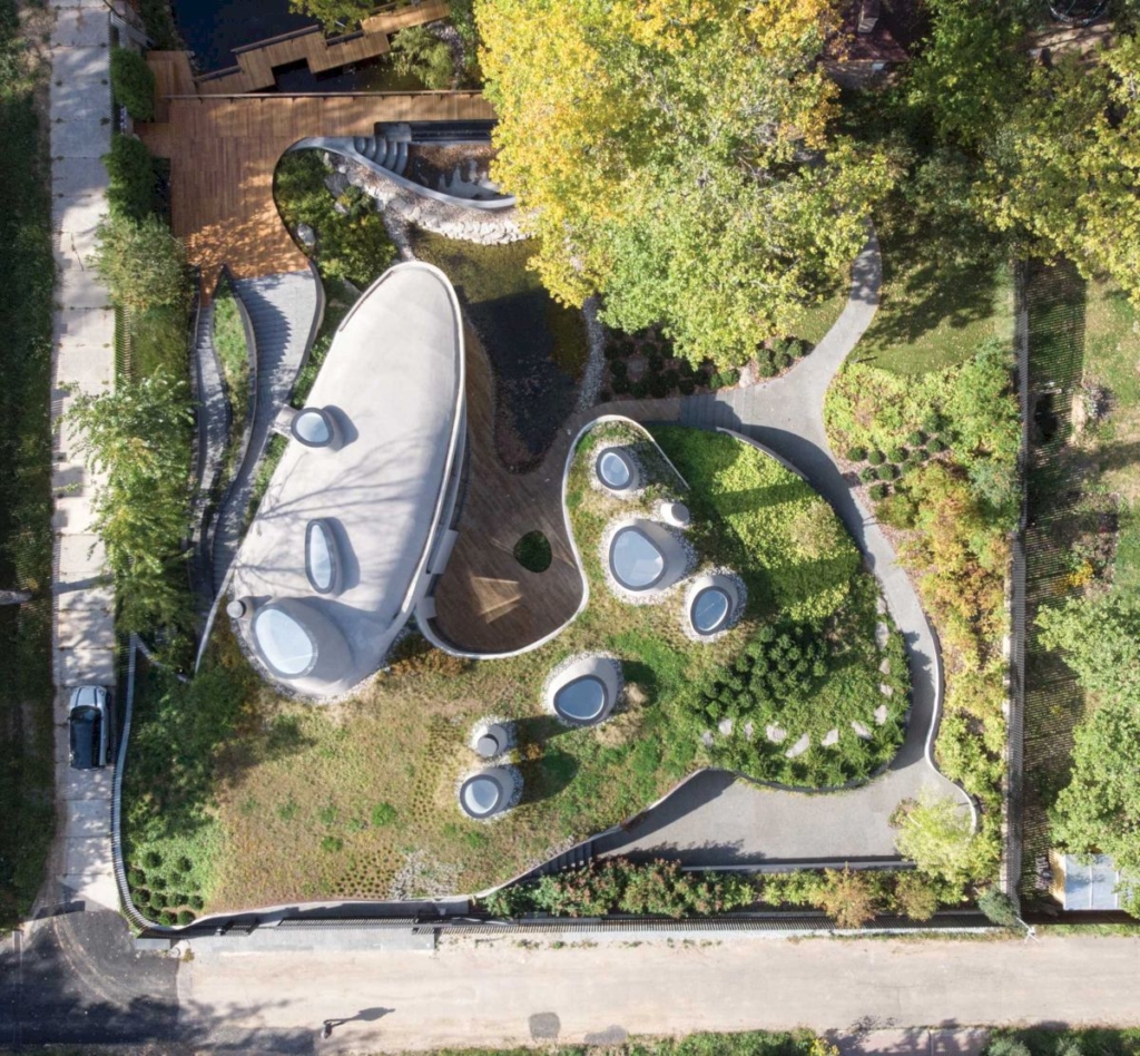 House in the Landscape Sculptural Home by Niko Architect 9