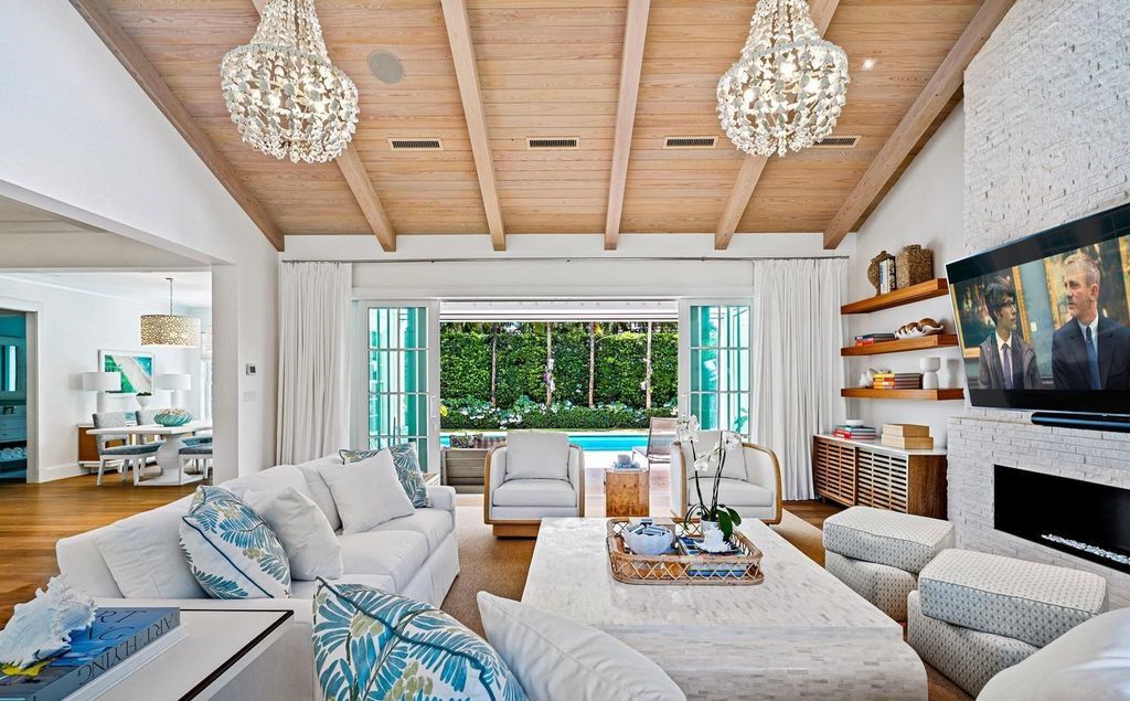 Indulge in luxurious coastal living at 156 Seagate, a meticulously designed haven nestled on Palm Beach Island's coveted North End.
