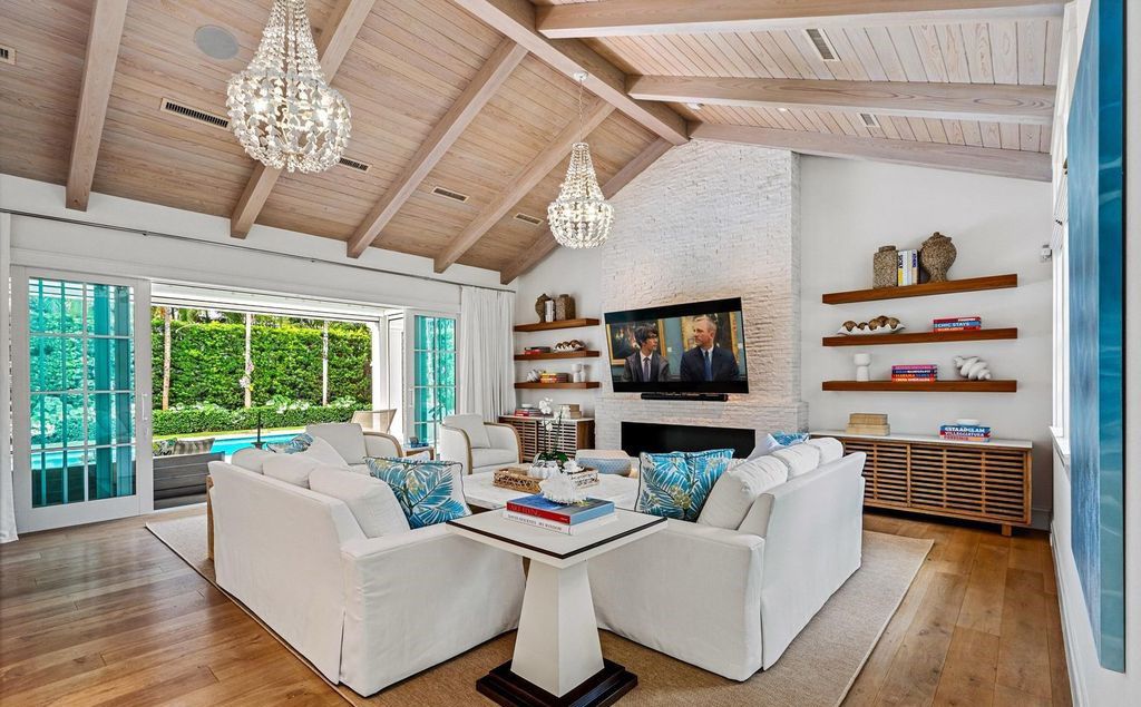Indulge in luxurious coastal living at 156 Seagate, a meticulously designed haven nestled on Palm Beach Island's coveted North End.