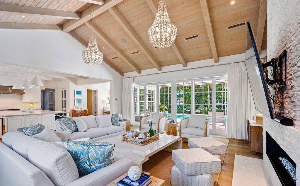 Indulge in luxurious coastal living at 156 Seagate, a meticulously designed haven nestled on Palm Beach Island's coveted North End.