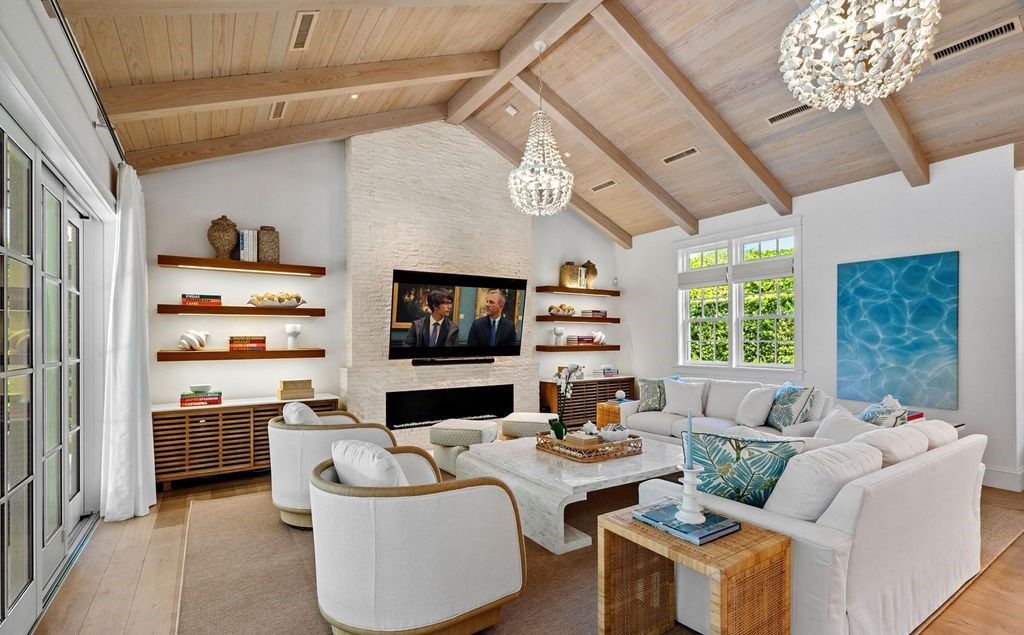 Indulge in luxurious coastal living at 156 Seagate, a meticulously designed haven nestled on Palm Beach Island's coveted North End.
