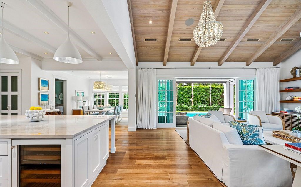 Indulge in luxurious coastal living at 156 Seagate, a meticulously designed haven nestled on Palm Beach Island's coveted North End.